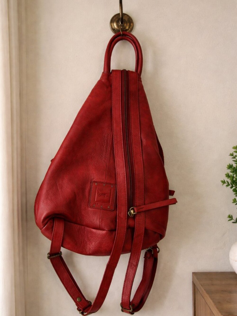 We The Free (Free People) distressed red leather convertible sling backpack